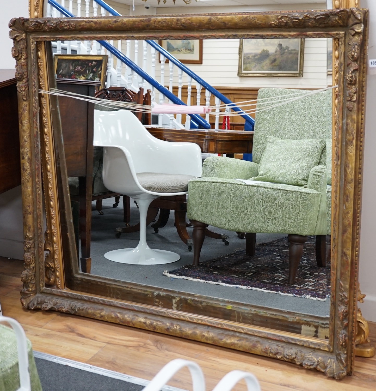 A large gilt picture frame, aperture size 100 x 125cm. Condition - fair
